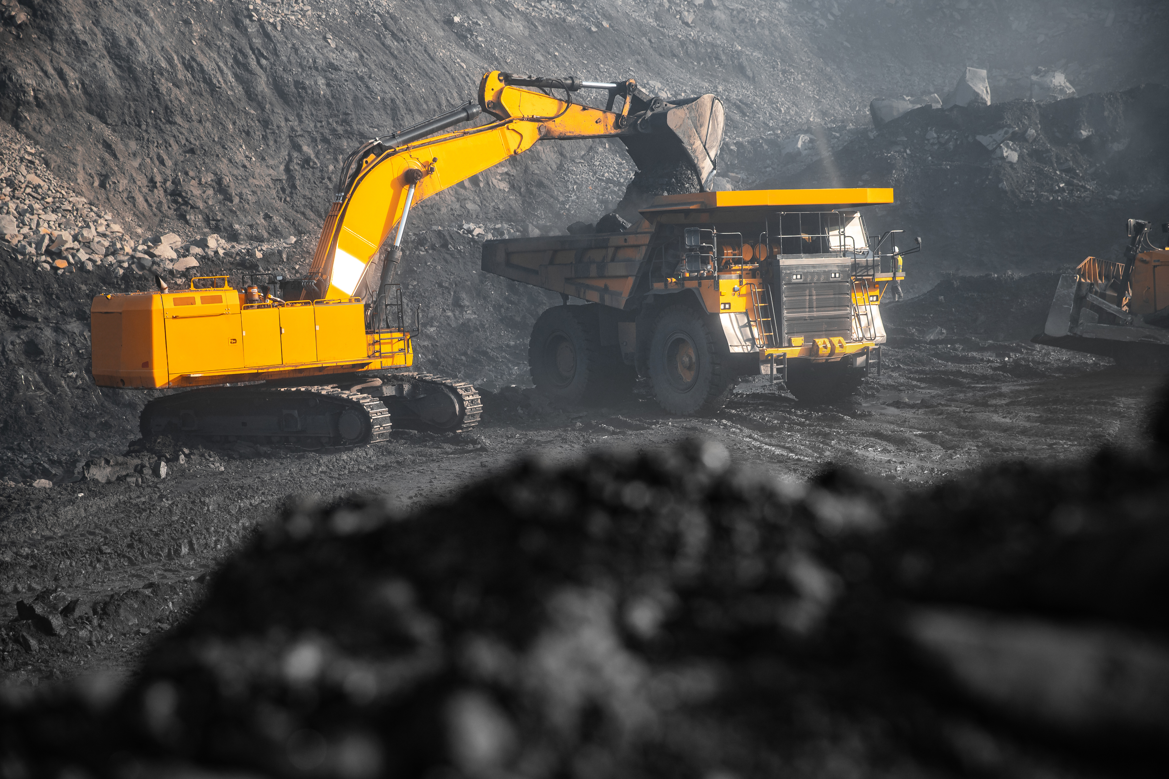 Mining excavator loading a haul truck